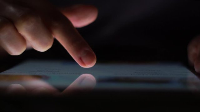 Hands using digital tablet computer