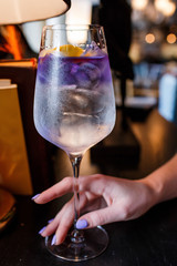 alcoholic cocktail in women's hands