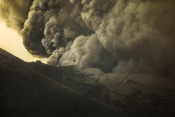 Series of photos from the eruption volcano Agung in Bali. Big smoke and ash cover the sky - obrazy, fototapety, plakaty