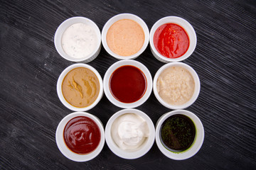 Sauces are collected, served with different dishes, fish, meat and garnish
