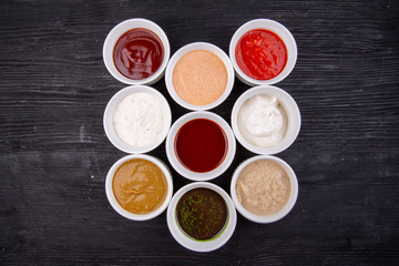 Sauces are collected, served with different dishes, fish, meat and garnish