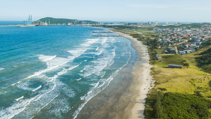 Aerial view of Porto beach, in Imbituba - SC. Beautiful beach in Imbituba city, Santa Catarina, Brazil