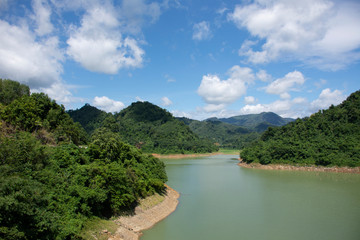 Fototapeta na wymiar View landscape of Bang Lang Reservoir and Pattani Dam with mountain and forest at Bannang Sata District of Yala Province, Thailand