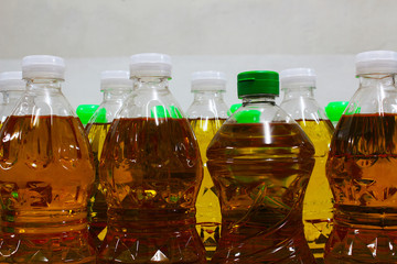 Vegetable oil packed in clear plastic bottles for sale