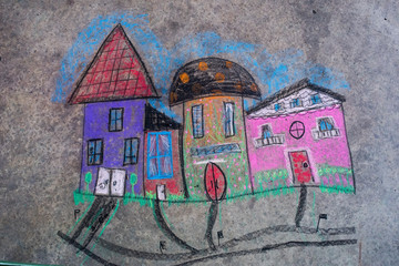 Sidewalk chalk art of houses 