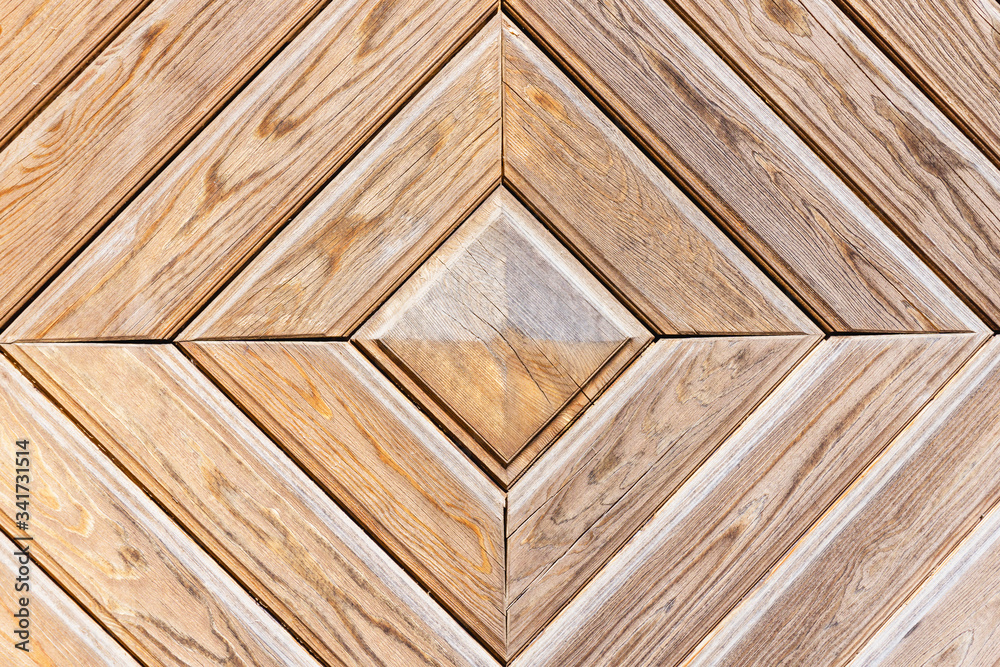 Wall mural Wooden door texture. Decorative wood design pattern. Square frame architecture background. Geometric carpentry wall. 