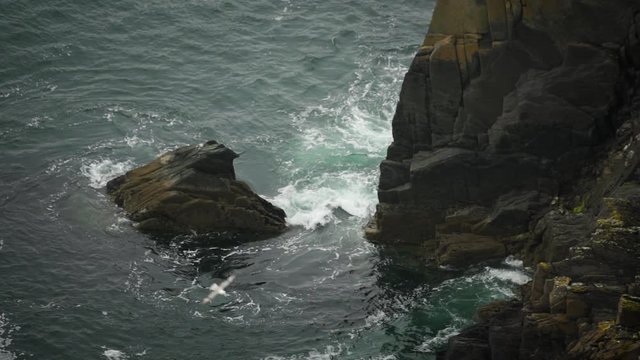 waves crashing on rocks slow motion