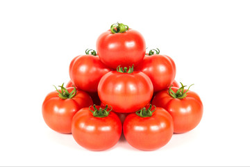 Group of red fresh tomatoes on a white background