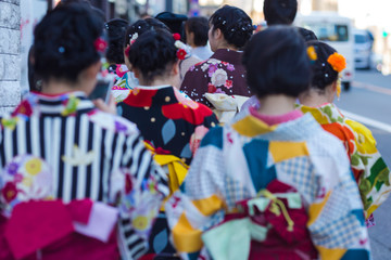 Asian Travel Destinations. Group of Female Geishas in Traditional Japanese Silk Kimono Walking on...