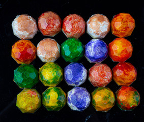 chocolate candies on black stone