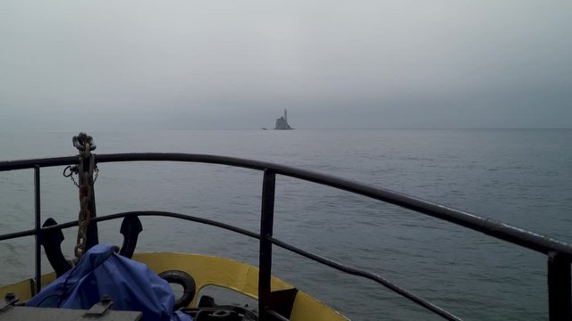 The fastnet lighthouse off the irish coast from ferry
