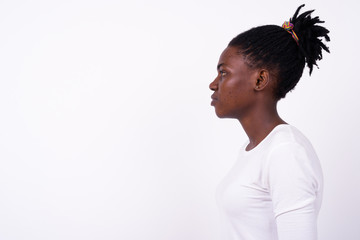 Closeup profile view of young beautiful African woman
