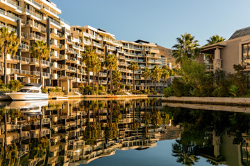 Modern apartment buildings by the canal in Cape Town, South Africa.