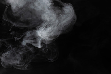 White steam on a black background.