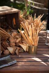 A bread basket on a table for a party or wedding catering 