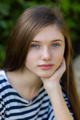 Fototapeta premium Beautiful teen girl in a marine striped shirt