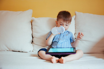 Fototapeta premium Addictive technology lifestyles for children in quarantine at home.