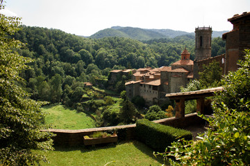 A beautiful view of the countryside in Spain with old stone structures in the form of a tower.