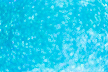 Fototapeta na wymiar The Abstract blur blue bokeh lighting from glitter texture,Defocused lights background (blue)