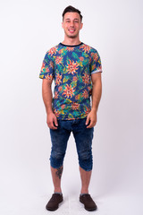 Obraz premium Full body shot of young handsome tourist man