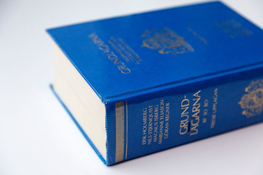 Umea, Norrland Sweden - March 23, 2020: statute book lying on a white table