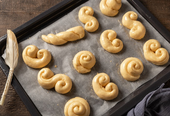 Naklejka premium Jidasky or jidase - traditional Czech sweet Easter pastry, before baking