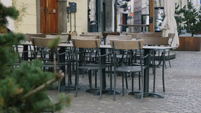 Close up shot of empty tables and chairs in the bar, restaurant, Ljubljana