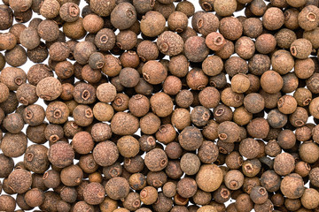 Allspice spice background. Natural texture, top view.