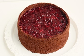 Delicious chocolate cake with cherries jam macro