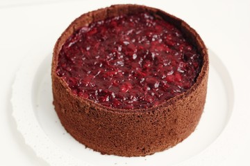 Delicious chocolate cake with cherries jam macro