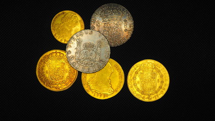 Dolar Español. Monedas de ocho escudos y ocho reales de oro y plata de España