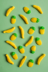 Colorful chewing sweets, sweets on a light green background. Food concept, Delicious marmalade, junkie food. Top view, save the space