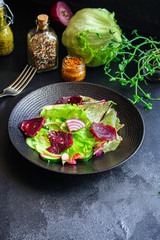 healthy salad beetroot slices, iceberg lettuce, greens. Menu concept food background, keto or paleo diet. top view. copy space for text