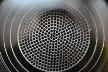 washing machine drum through glass closeup