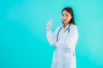 Portrait beautiful young asian doctor woman with syringe injection