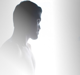 portrait silhouette man asia  topless turned sideways in appearance at fade