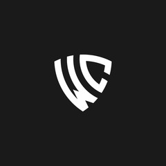 WC monogram logo with shield shape