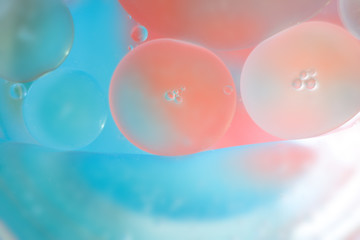abstract background with bubbles oil drops on the water surface