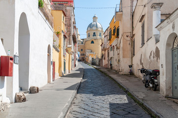 Fototapeta na wymiar nice narrow street and colored building in Procida near Naples, Italy
