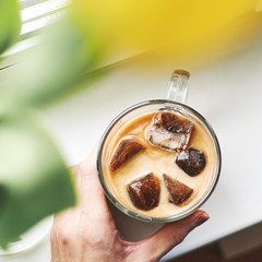 Frozen coffee cubes for instant espresso with milk or warm coffee drink