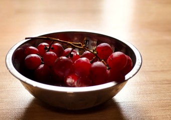 bowl of red grape.