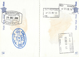 Stamps of Australia, UAE, Serbia, Montenegro and Bosnia and Herzegovina in a French passport. Personal data removed