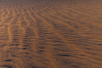 Quartz and Feldspar Make Up The Rippled Dunes of THe Mesquite Flat Sand Dunes, Death Valley...