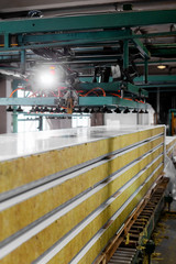 production of building panels with insulation