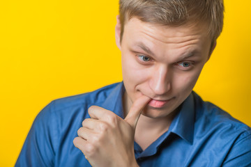 This man is thinking really hard. He is absolutely not sure if he wants to do what you asked.