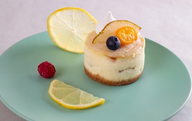 Lemon Cheesecake on a Green Plate