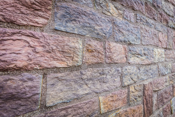 Urban stone wall with details and natural colors
