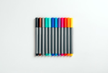 Naklejka premium Set of multicolor felt pens, markers on white background, colorful fineliners.