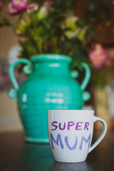 the Super mum's cup on the table