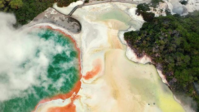 Geothermal Landscape with hot boiling mud and sulphur springs due to volcanic activity in Wai-O-Tapu, Thermal Wonderland New Zealand